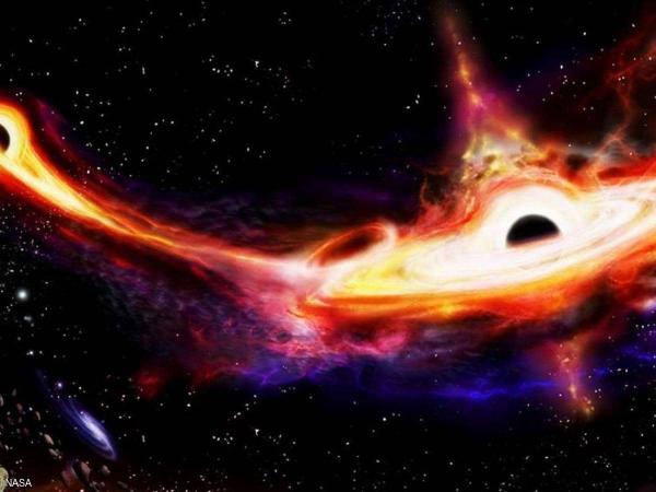 Clash of the Titans. 3 giant black holes in a collision course